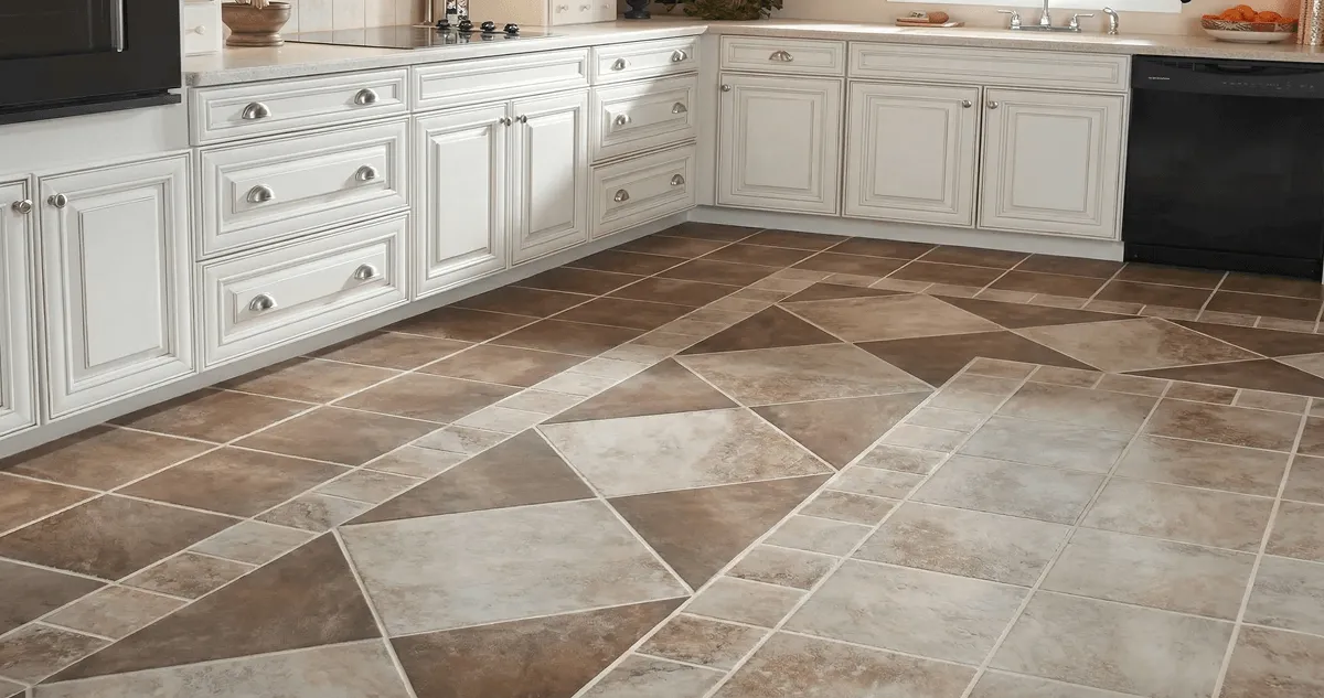 Kitchen with white cabinets and a professionally installed tile floor in Peoria, IL