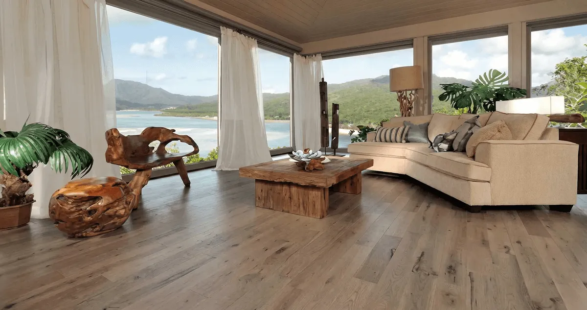 Professionally installed vinyl flooring in a modern living room with large windows in Peoria, IL